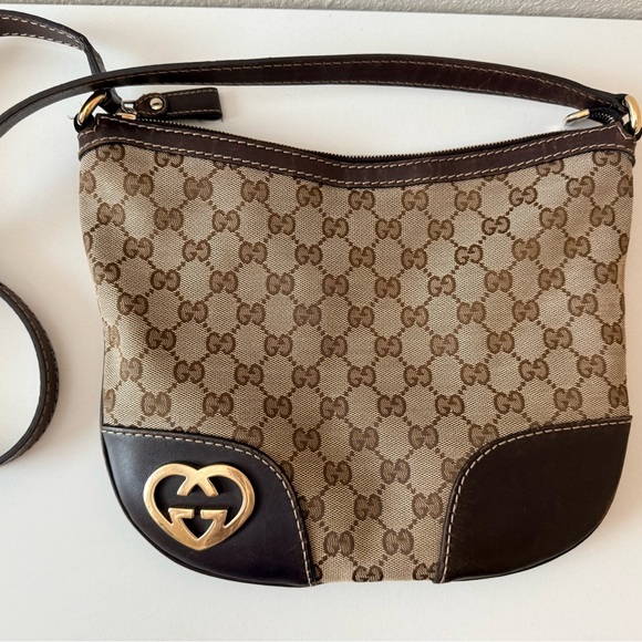 Gucci Handbags - Gucci GG Canvas Lovely Heart Crossbody Bag